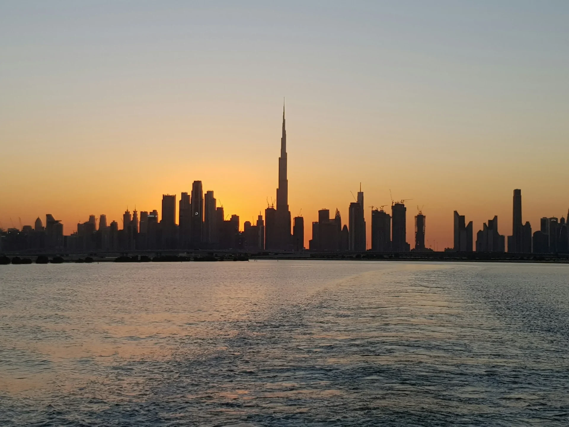 A city skyline at dusk.